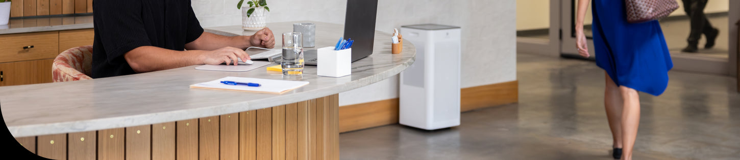 an office entryway with an air purifier