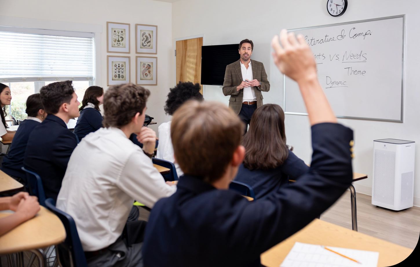 a classroom of students and an air purifier