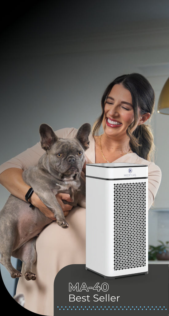 MA-40 Air Purifier with a lady and her dog smiling.