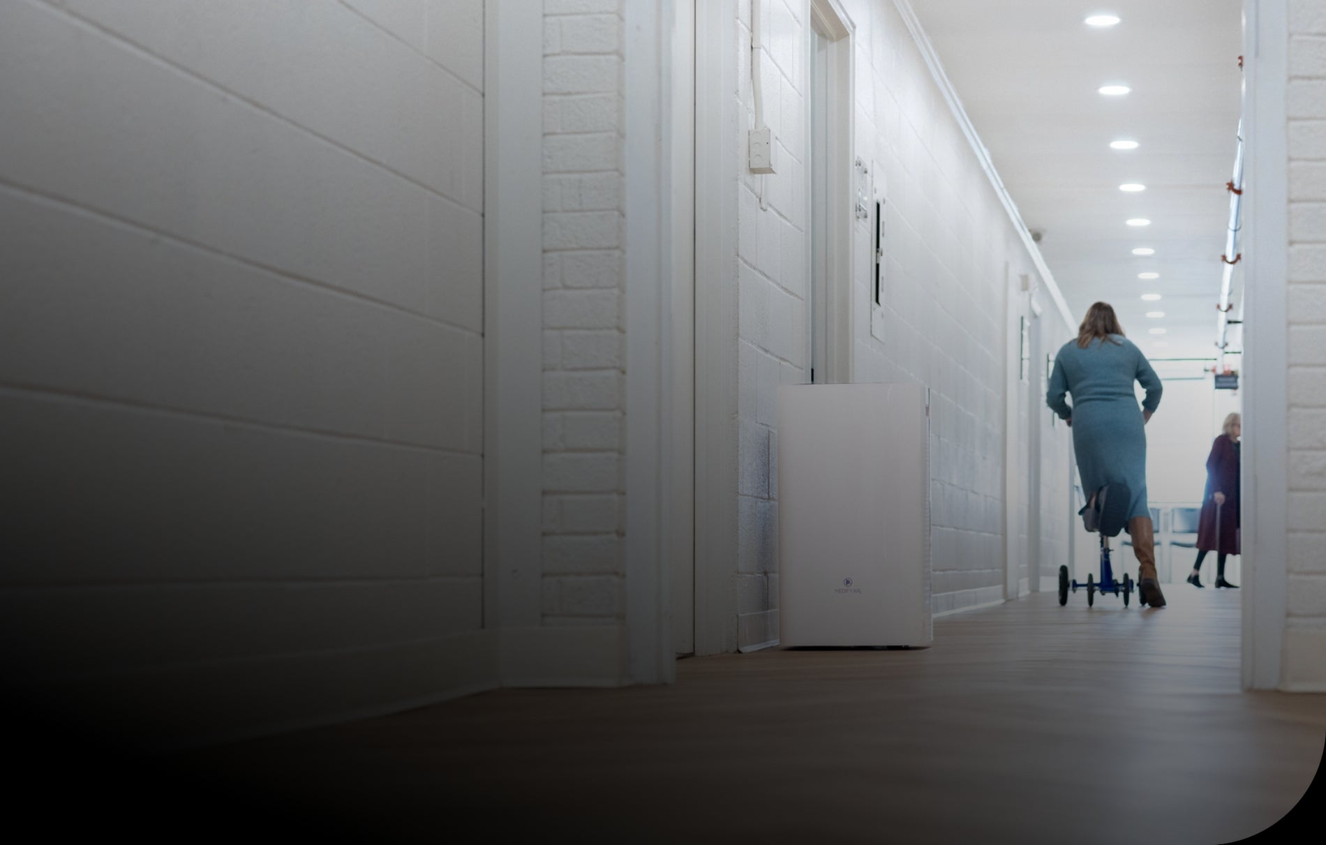 an air purifier in the hallway of a hospital