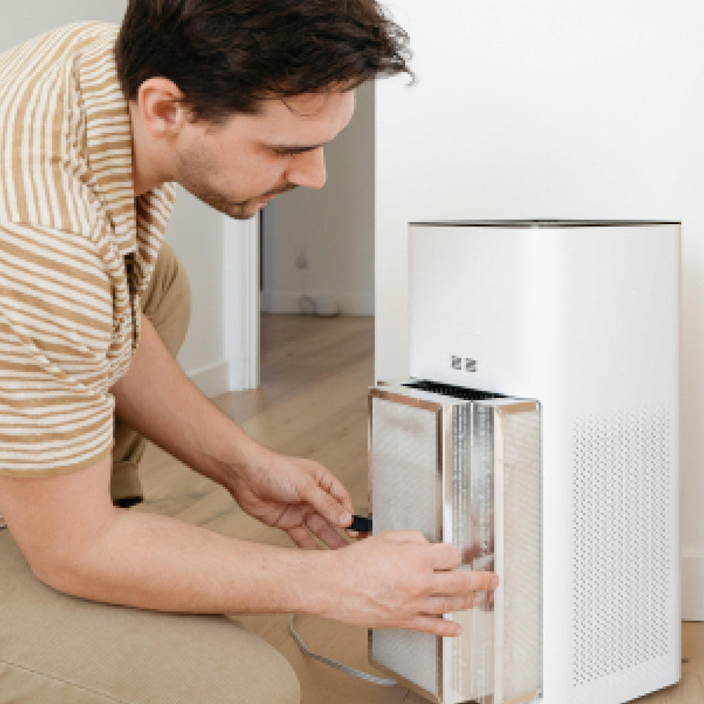 Man Changing MA-50 Air Purifier HEPA Filter